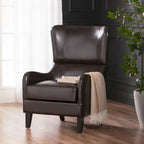 Sillón decorativo de respaldo alto con diseño de orejero y patas de madera de abedul