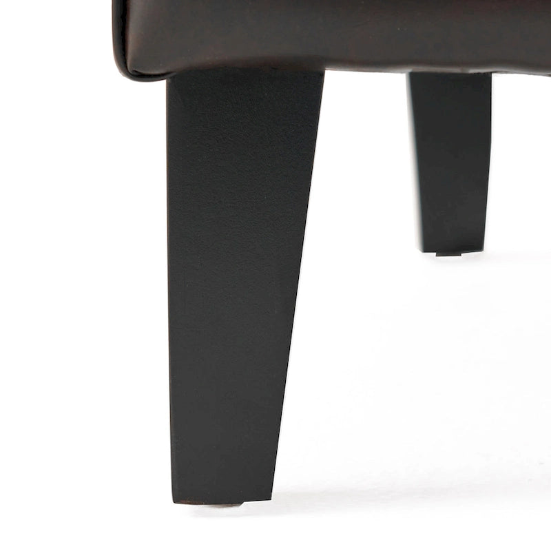 Sillón decorativo de respaldo alto con diseño de orejero y patas de madera de abedul