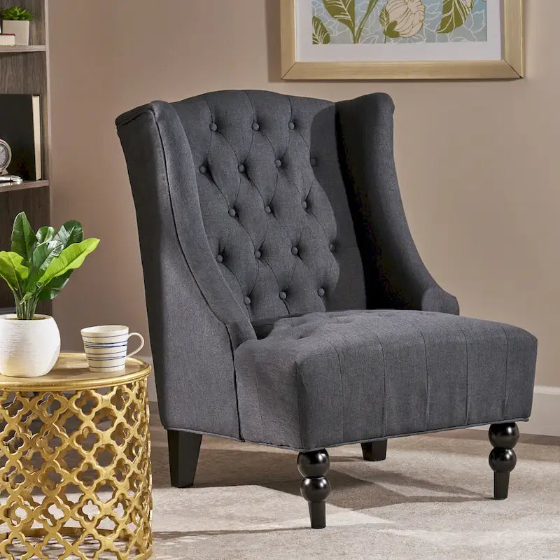 Sillón club tapizado de respaldo alto color carbón con botones y copetudo
