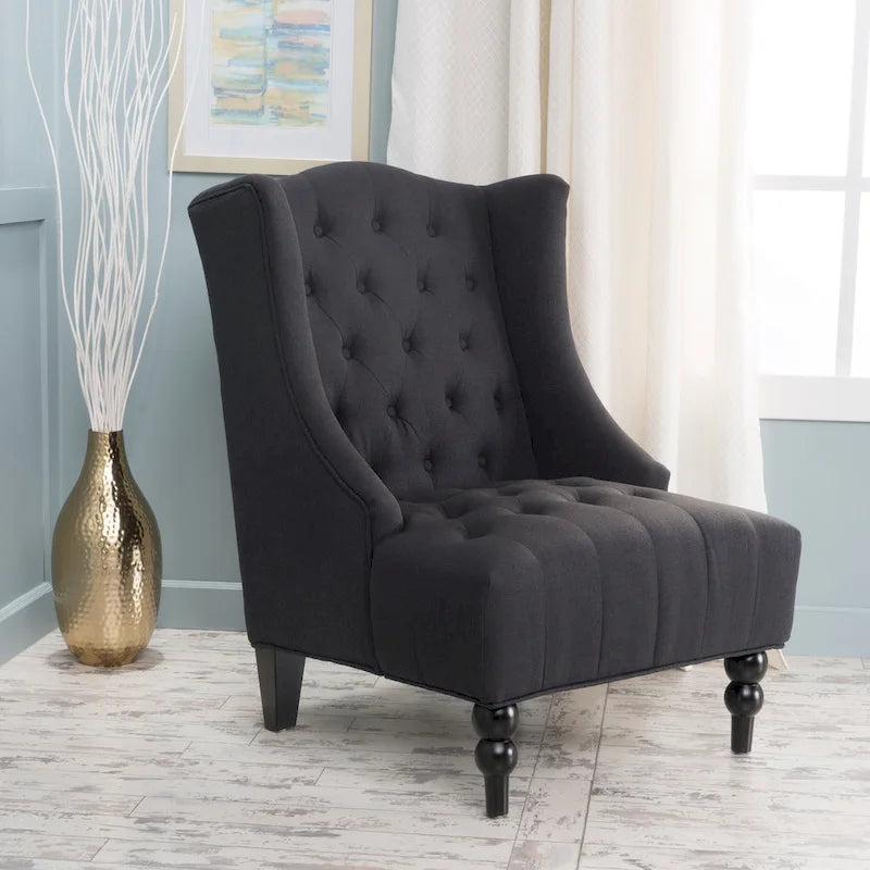 Sillón club tapizado de respaldo alto color carbón con botones y copetudo