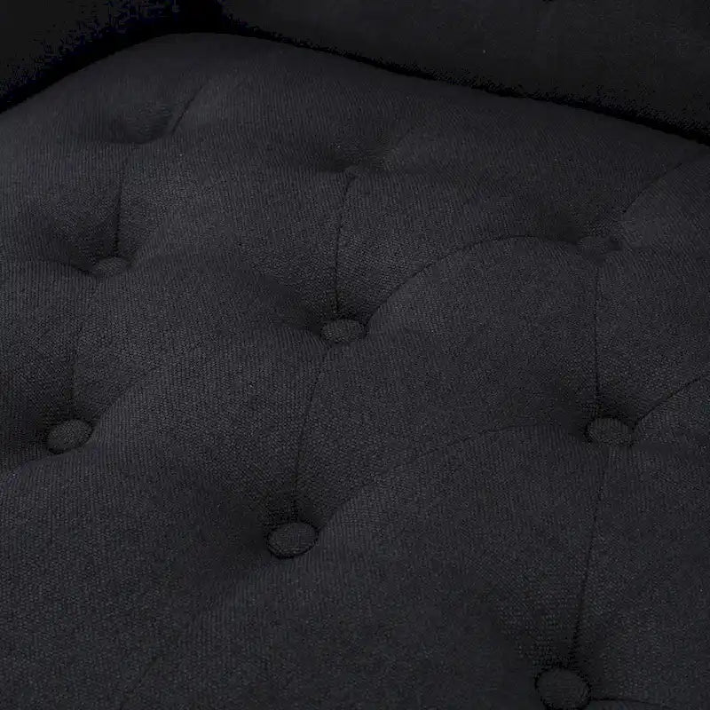 Sillón club tapizado de respaldo alto color carbón con botones y copetudo