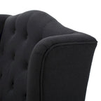 Sillón club tapizado de respaldo alto color carbón con botones y copetudo