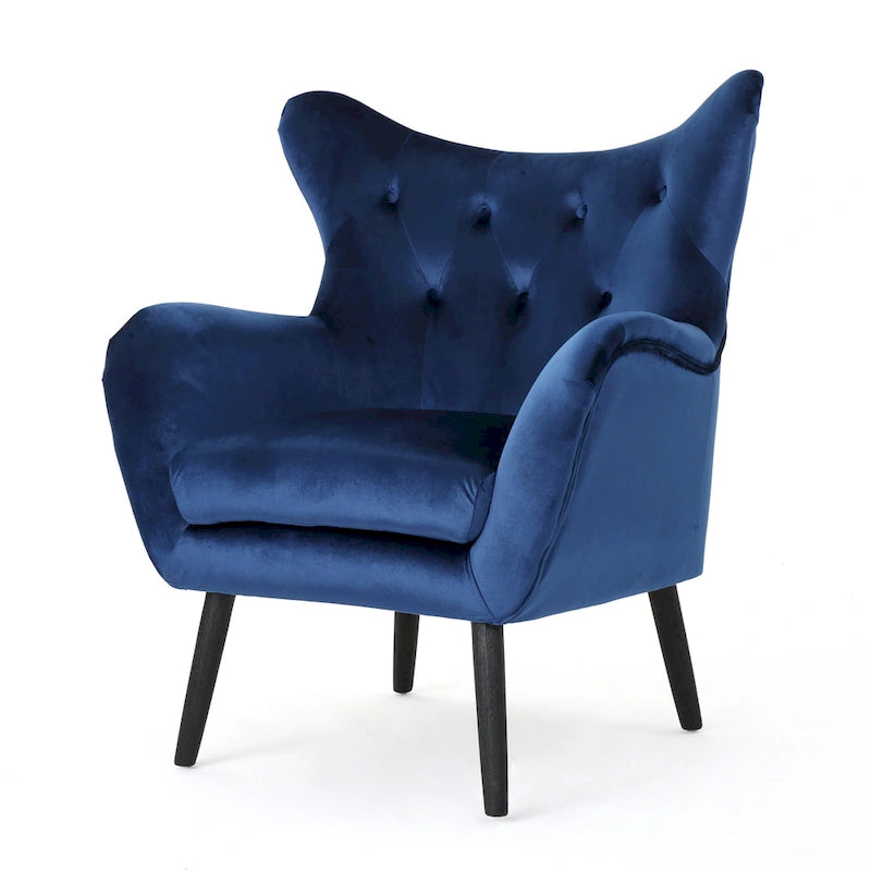 Sillón auxiliar tapizado en terciopelo azul marino con orejeras