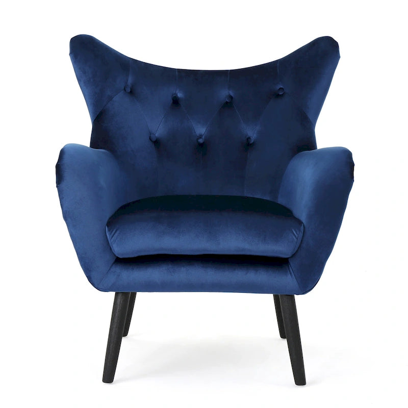 Sillón auxiliar tapizado en terciopelo azul marino con orejeras