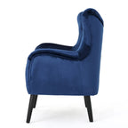 Sillón auxiliar tapizado en terciopelo azul marino con orejeras