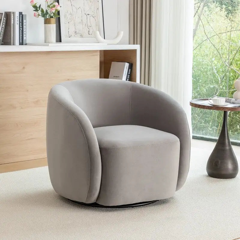 Sillón decorativo giratorio 360 grados tapizado en terciopelo