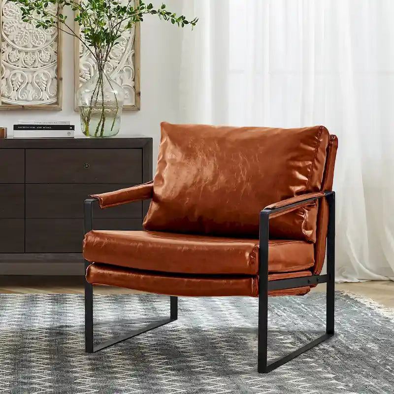 Sillón tapizado en piel sintética moderna con estructura de acero