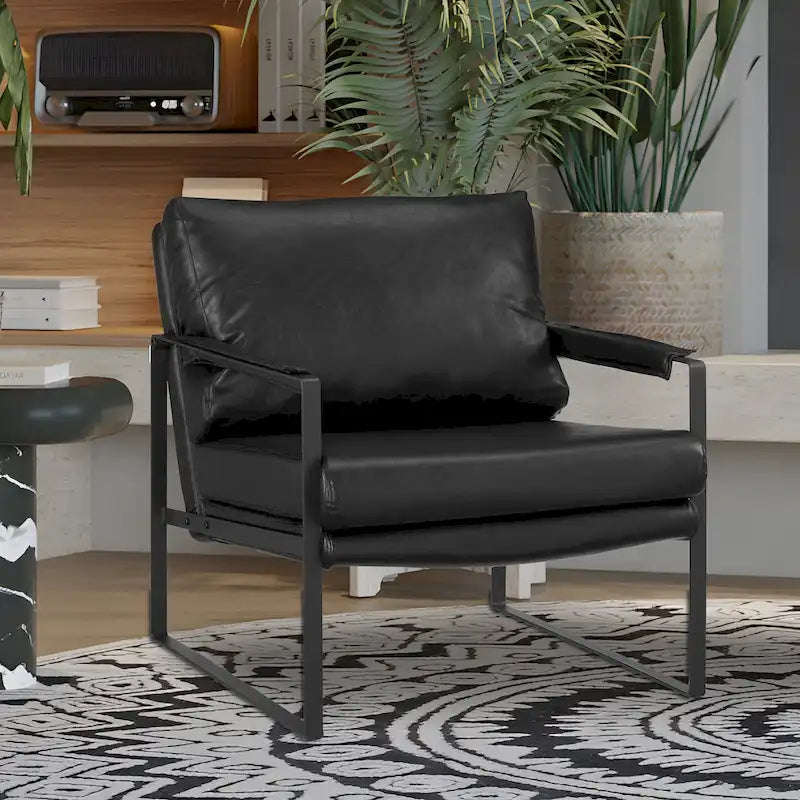 Sillón tapizado en piel sintética moderna con estructura de acero