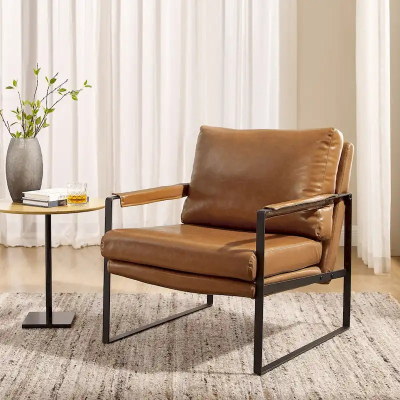 Sillón tapizado en piel sintética moderna con estructura de acero