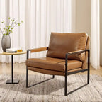 Sillón tapizado en piel sintética moderna con estructura de acero