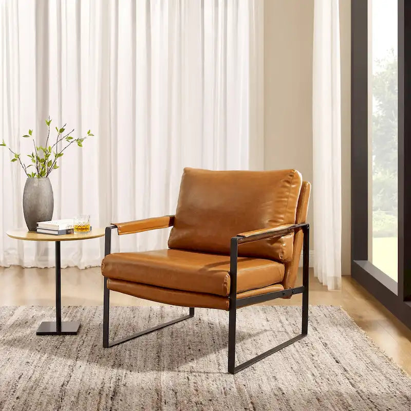 Sillón tapizado en piel sintética moderna con estructura de acero