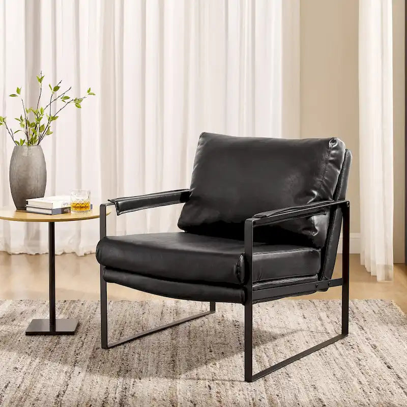 Sillón tapizado en piel sintética moderna con estructura de acero