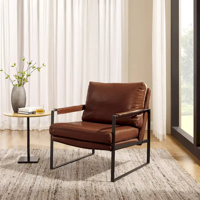 Sillón tapizado en piel sintética moderna con estructura de acero