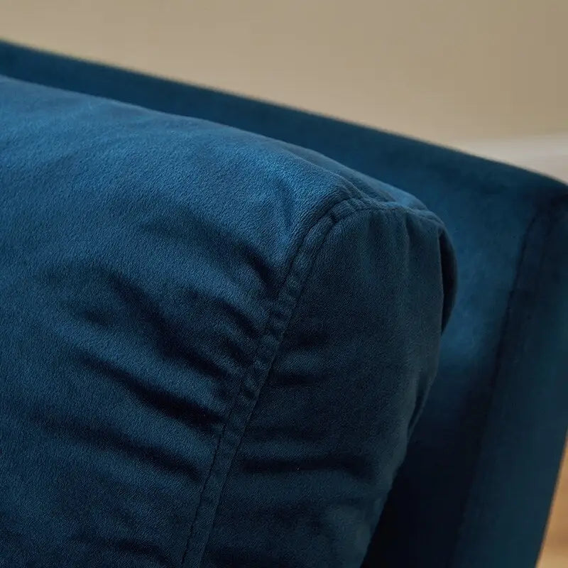 Sillón tapizado en piel sintética moderna con estructura de acero