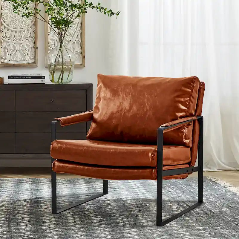 Sillón tapizado en piel sintética moderna con estructura de acero