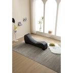 Chaise longue de yoga con tapizado de piel sintética y estructura curva