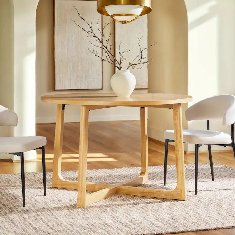 Mesa de comedor redonda de madera maciza con patas geométricas