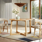 Mesa de comedor redonda de madera maciza con patas geométricas