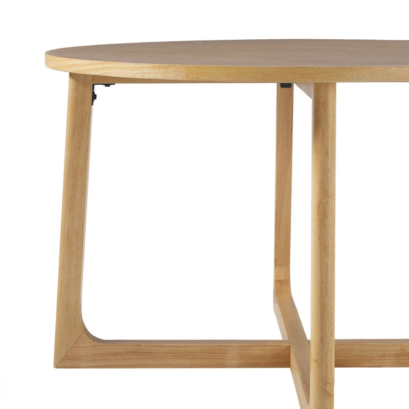 Mesa de comedor redonda de madera maciza con patas geométricas