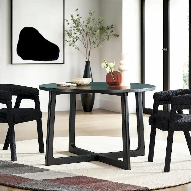 Mesa de comedor redonda de madera maciza con patas geométricas