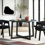 Mesa de comedor redonda de madera maciza con patas geométricas