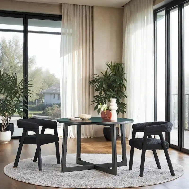 Mesa de comedor redonda de madera maciza con patas geométricas