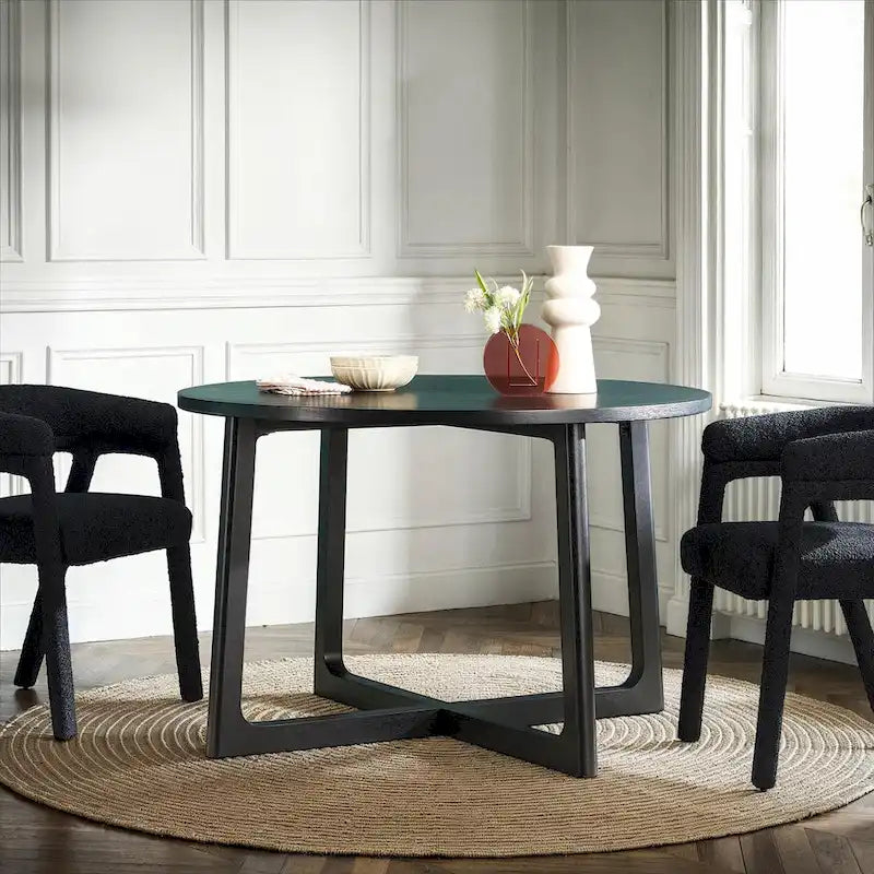 Mesa de comedor redonda de madera maciza con patas geométricas