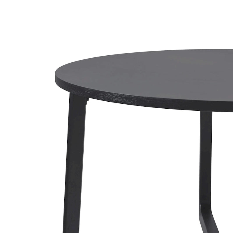 Mesa de comedor redonda de madera maciza con patas geométricas